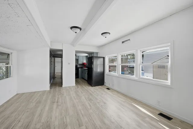 a view of a room that has window in it