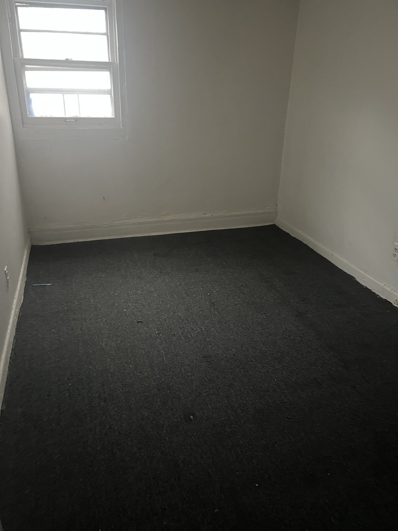 1845 East 93rd Street, Unit 2E Chicago, IL 60617 - Photo 5 of 8 a view of room and window