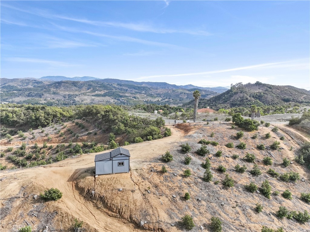 45811 Camaron Road Temecula, CA 92590 - Photo 1 of 21 a view of a backyard with a mountain