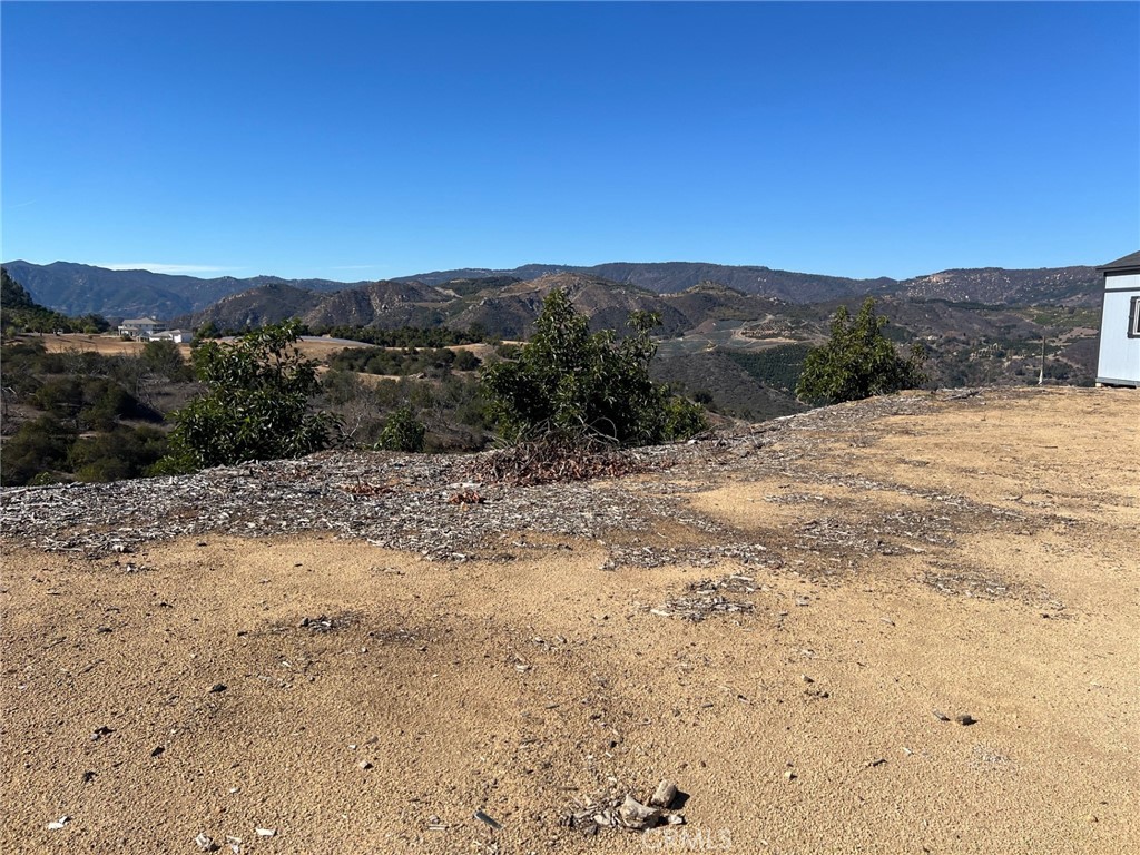 45811 Camaron Road Temecula, CA 92590 - Photo 15 of 21 a view of a dry yard with mountain