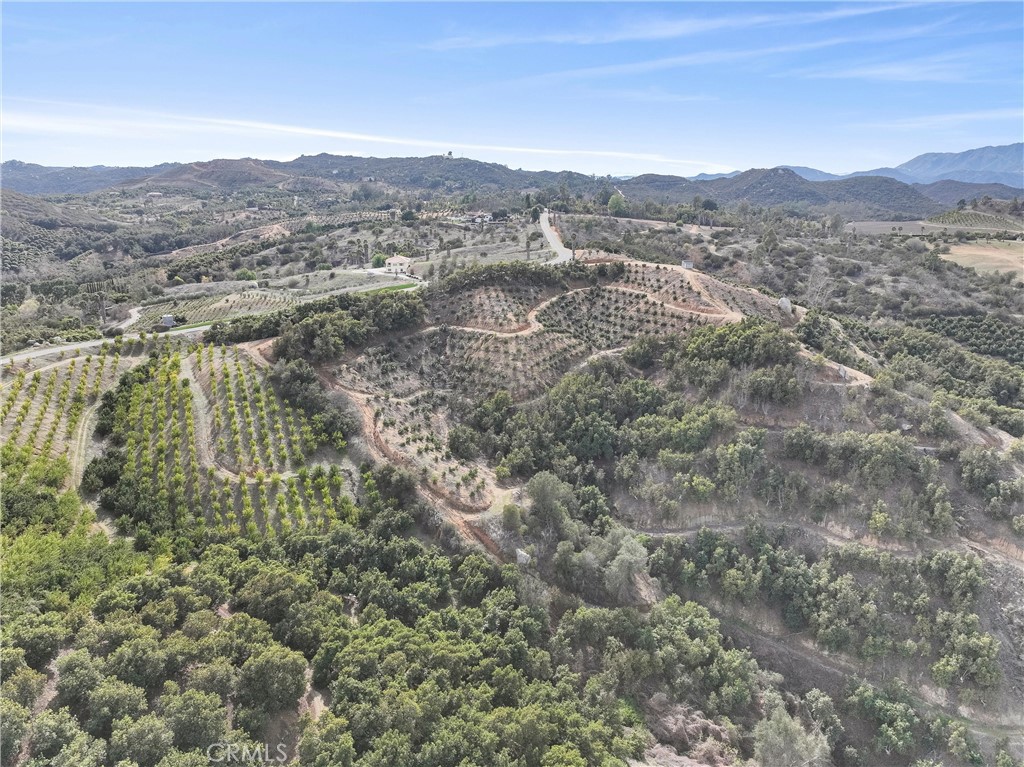 45811 Camaron Road Temecula, CA 92590 - Photo 10 of 21 a view of a lake with mountains in the background