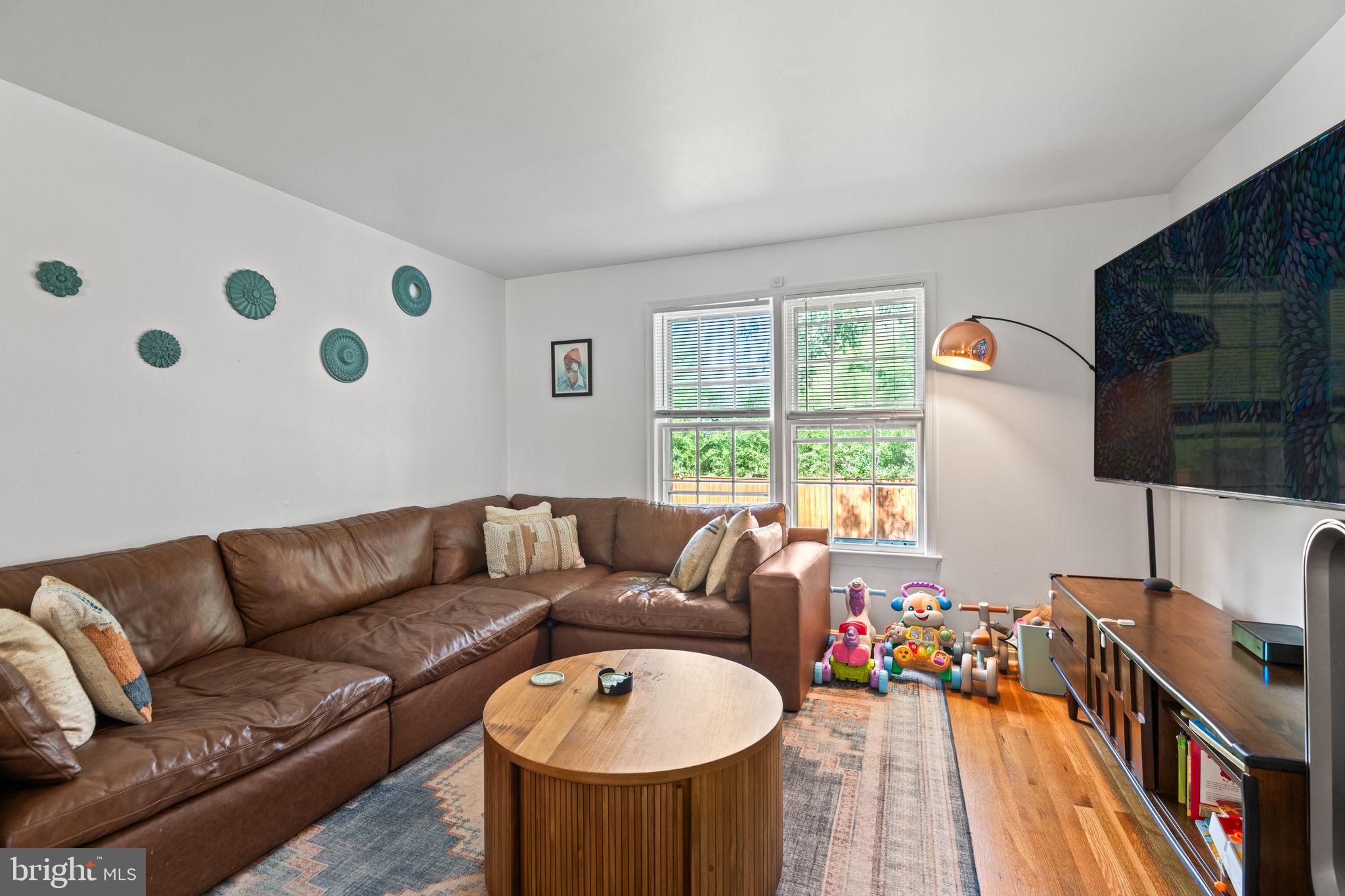 1007 Arcola Avenue Silver Spring, MD 20902 - Photo 5 of 33 Living room filled with natural light.
