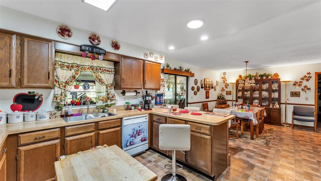 1301 Lanier Road Lakeland, FL 33810 - Photo 11 of 45 a view of a kitchen with appliances and cabinets