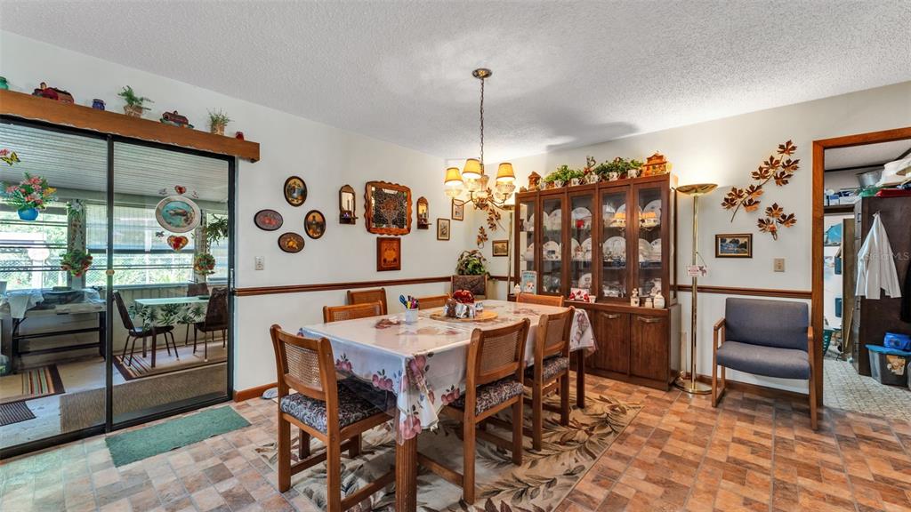 1301 Lanier Road Lakeland, FL 33810 - Photo 12 of 45 a view of a dining room with furniture
