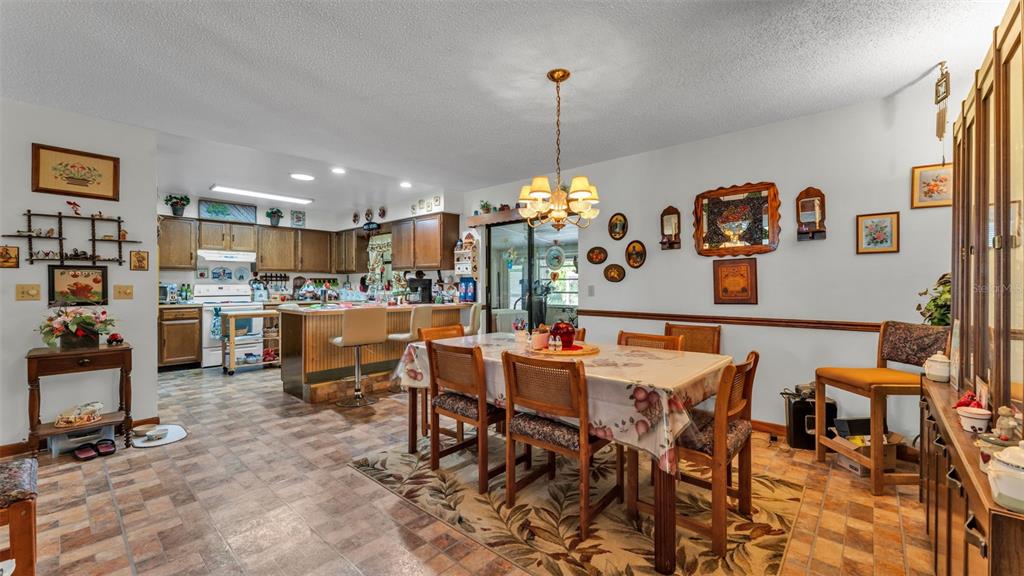 1301 Lanier Road Lakeland, FL 33810 - Photo 13 of 45 a view of a dining room with furniture