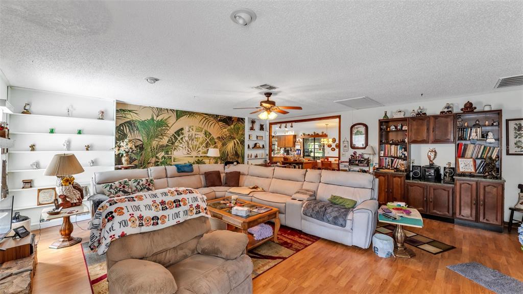 1301 Lanier Road Lakeland, FL 33810 - Photo 16 of 45 a living room with furniture and a large window