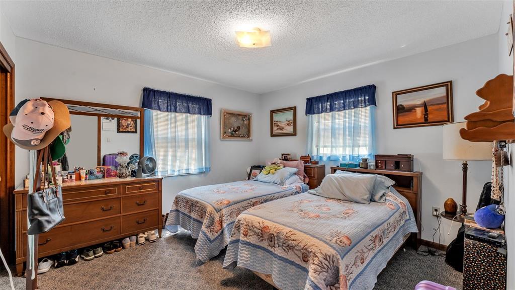 1301 Lanier Road Lakeland, FL 33810 - Photo 23 of 45 a bedroom with bed and window