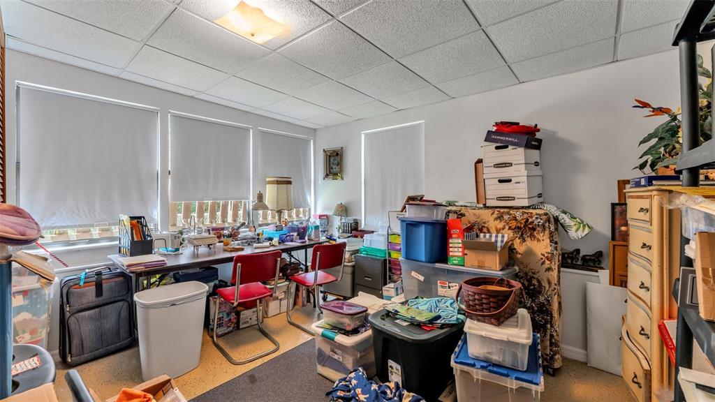 1301 Lanier Road Lakeland, FL 33810 - Photo 30 of 45 a room with furniture a rug and gym equipment