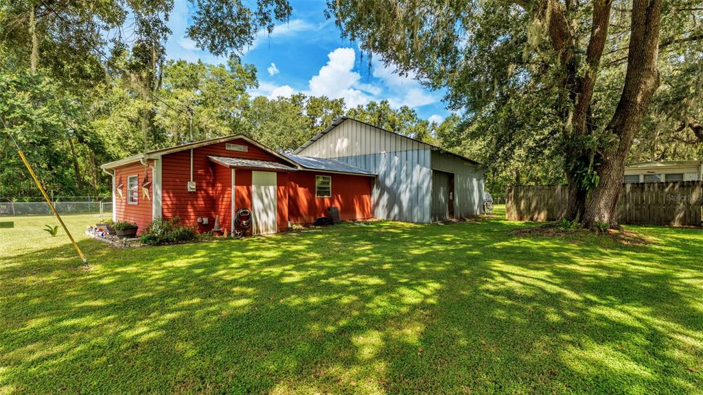 1301 Lanier Road Lakeland, FL 33810 - Photo 35 of 45 a front view of a house with a garden