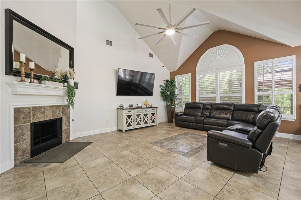 1973 Garrison Way Garland, TX 75040 - Photo 14 of 29 a living room with furniture and a flat screen tv