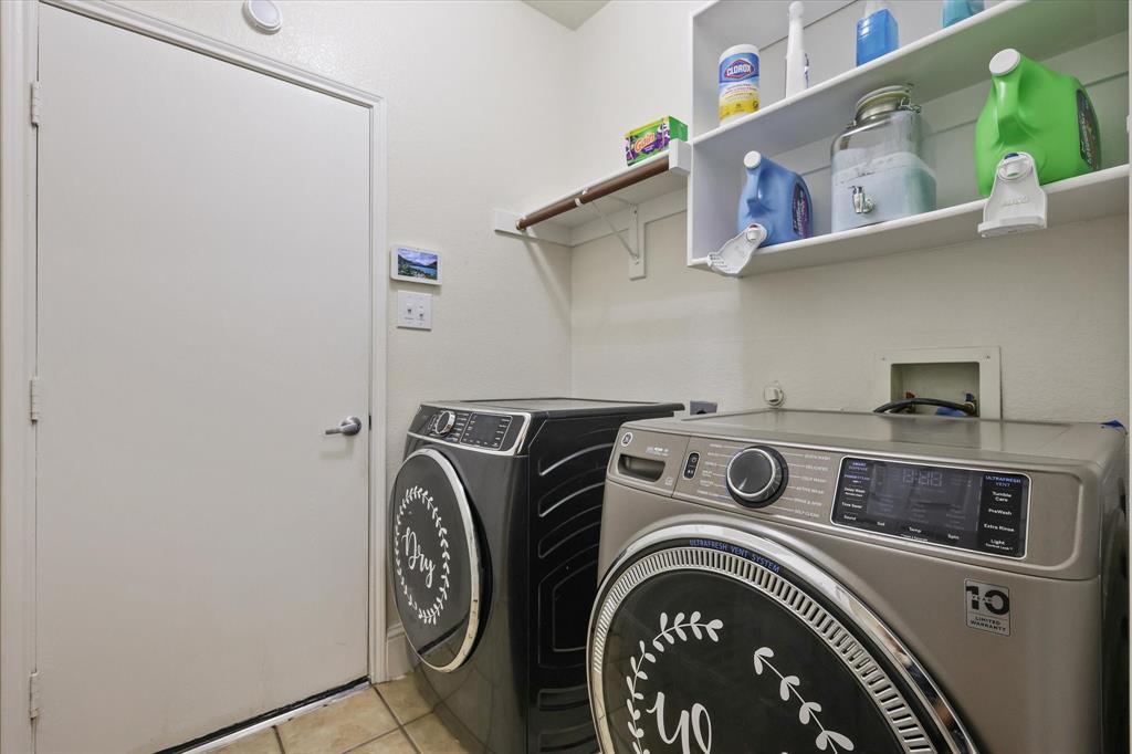 1973 Garrison Way Garland, TX 75040 - Photo 15 of 29 a view of washer and dryer in a utility room