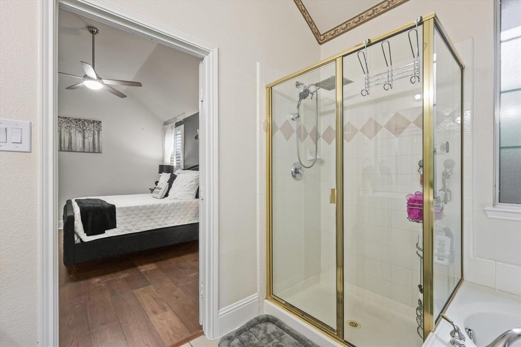 1973 Garrison Way Garland, TX 75040 - Photo 19 of 29 a bathroom with a shower and a sink