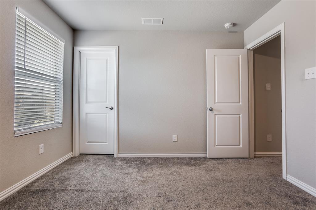 3808 Barnett Road Rowlett, TX 75089 - Photo 11 of 13 a view of an empty room with window and closet area
