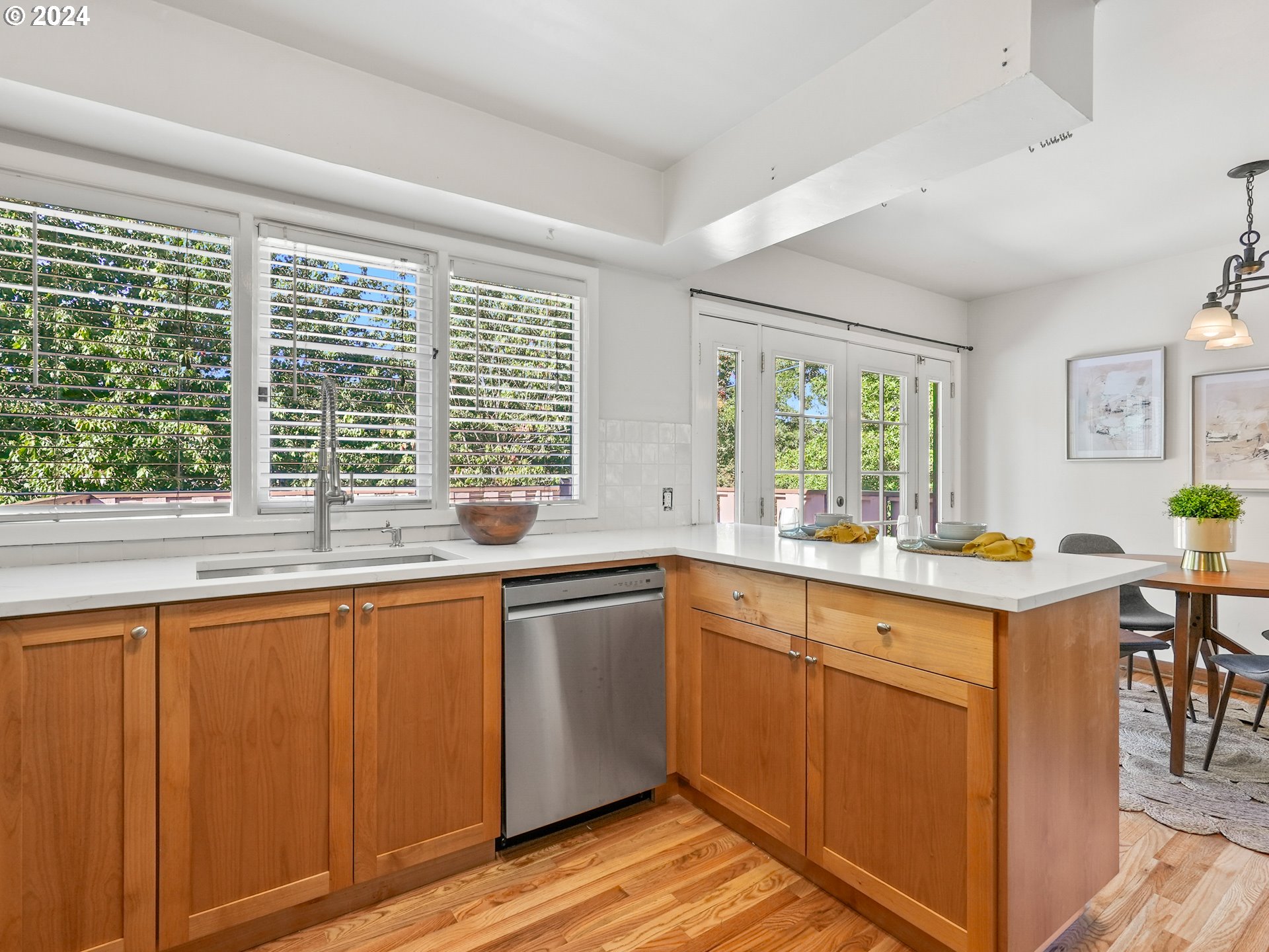 5525 Southwest Florida Street Portland, OR 97219 - Photo 15 of 44 a kitchen with granite countertop a sink and a stove
