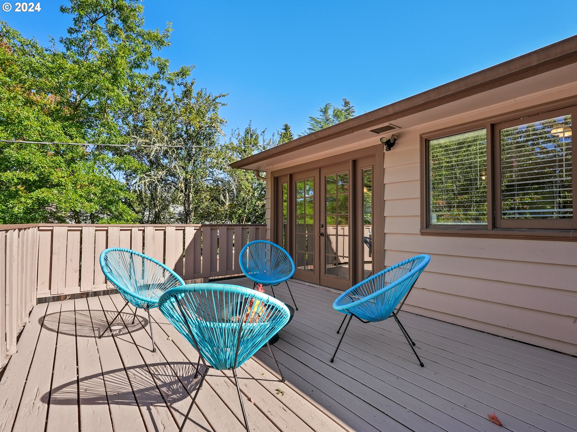 5525 Southwest Florida Street Portland, OR 97219 - Photo 17 of 44 a view of a chair and table on the deck