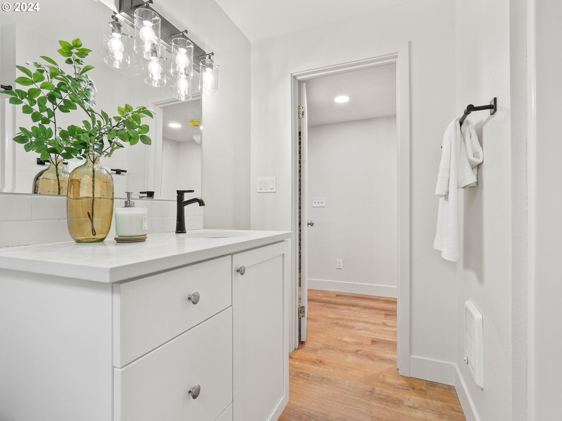 5525 Southwest Florida Street Portland, OR 97219 - Photo 34 of 44 a bathroom with a sink a vanity and a mirror