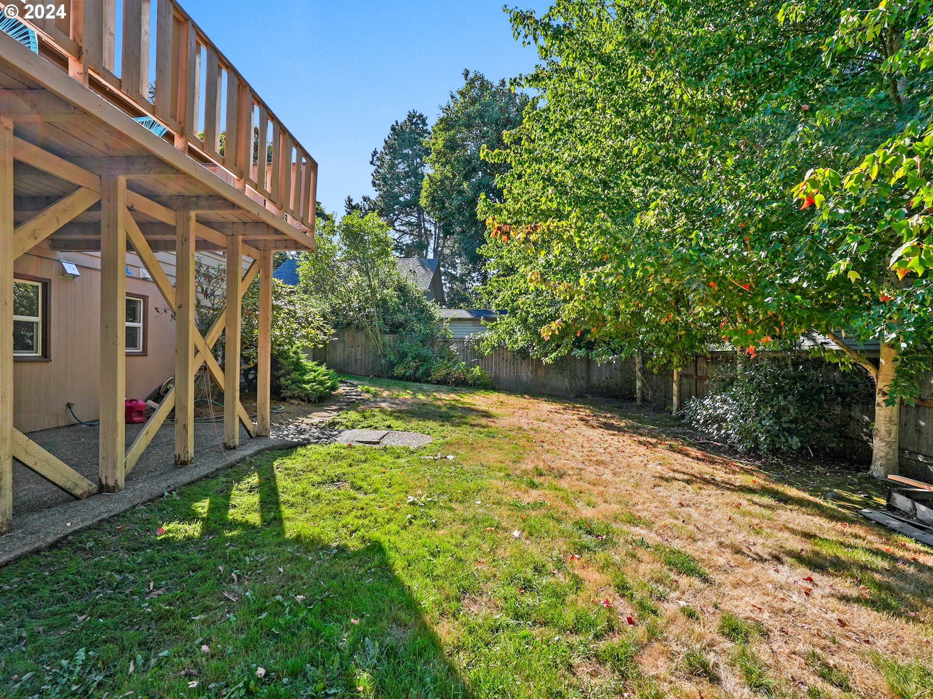 5525 Southwest Florida Street Portland, OR 97219 - Photo 39 of 44 a view of a big yard with large trees