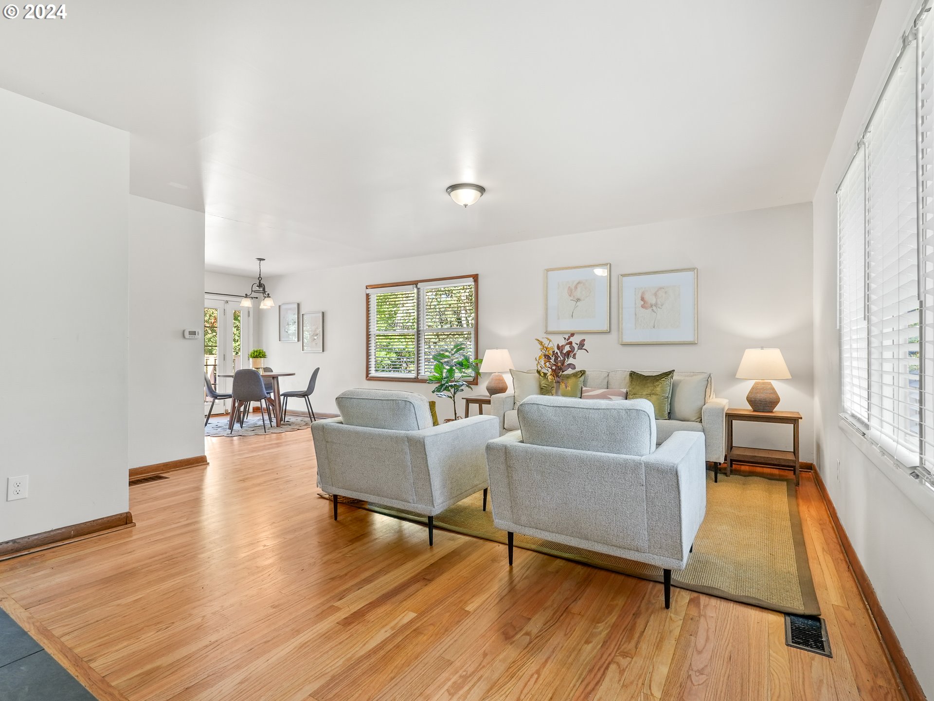 5525 Southwest Florida Street Portland, OR 97219 - Photo 5 of 44 a living room with furniture and a wooden floor