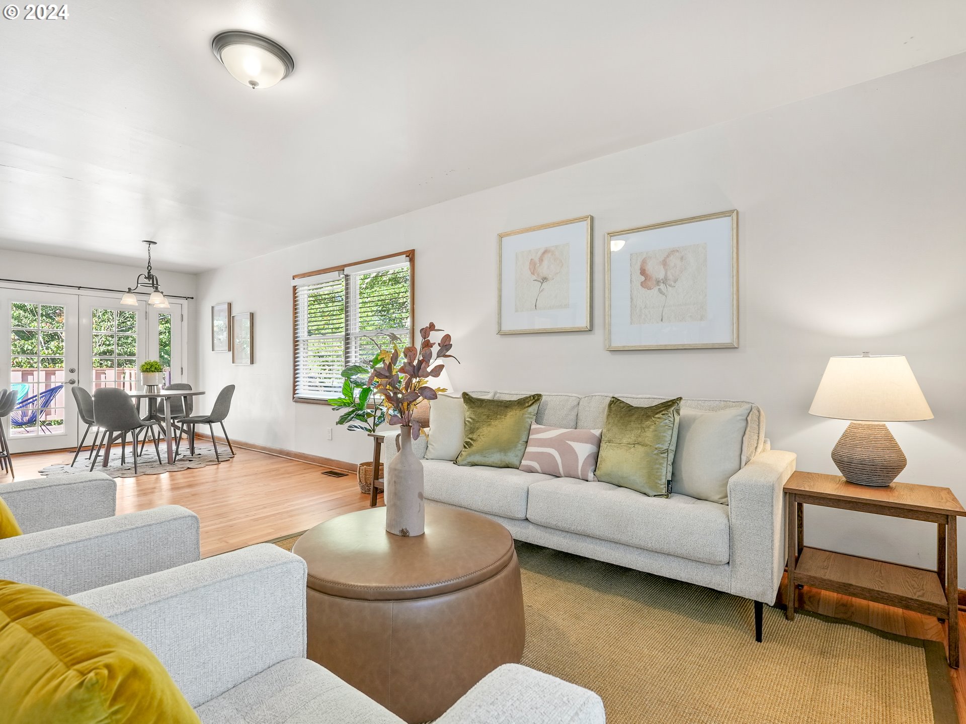 5525 Southwest Florida Street Portland, OR 97219 - Photo 8 of 44 a living room with furniture and a large window