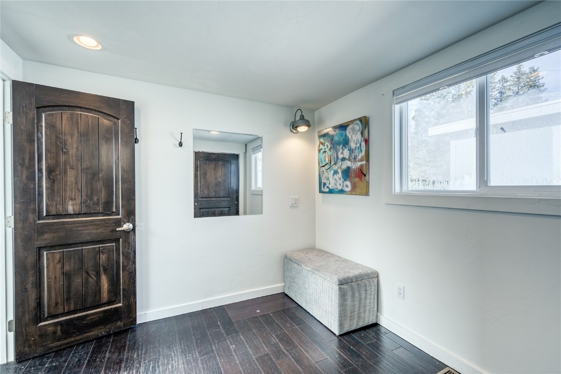 847 Airport Road, Unit 14 Breckenridge, CO 80424 - Photo 17 of 27 a living room with furniture and large window