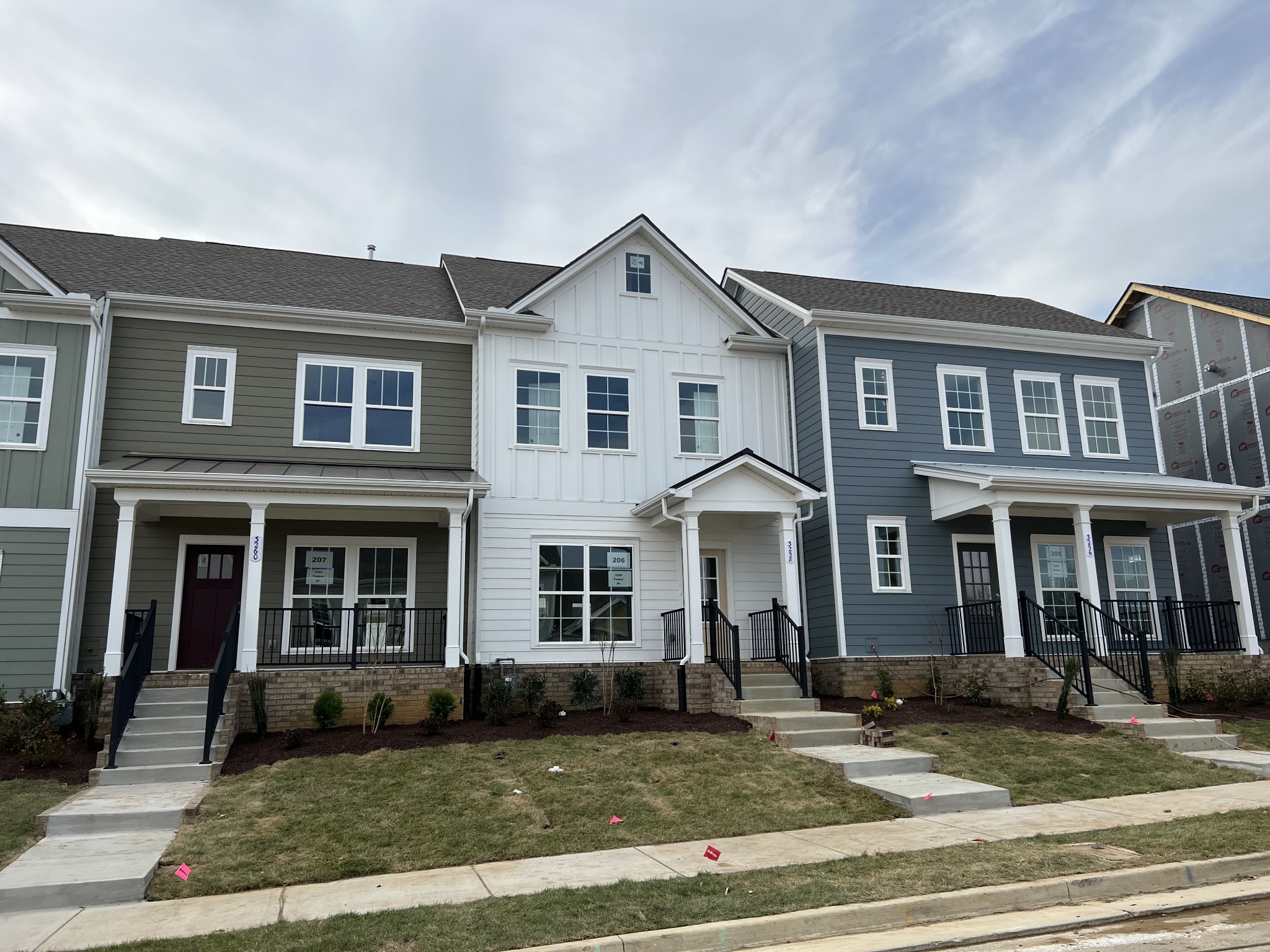 3258 Tasker Drive Antioch, TN 37013 - Photo 2 of 26 a front view of a house with a yard