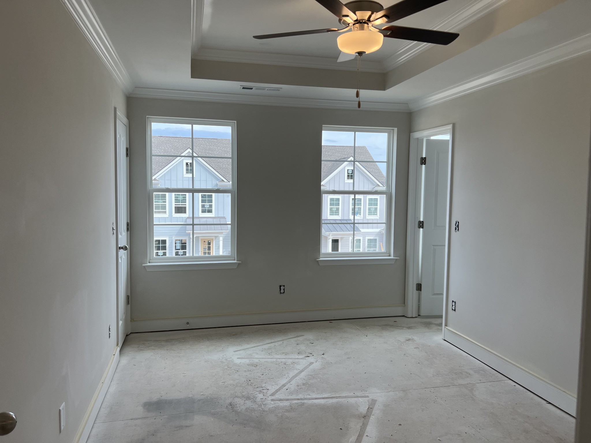 3258 Tasker Drive Antioch, TN 37013 - Photo 10 of 26 an empty room with windows and fan