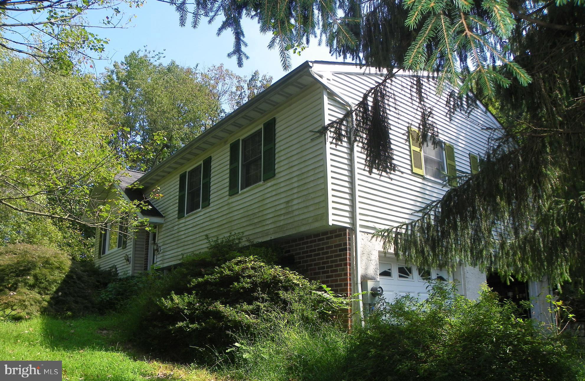 1560 County Line Road Bechtelsville, PA 19505 - Photo 32 of 37 Side view from driveway