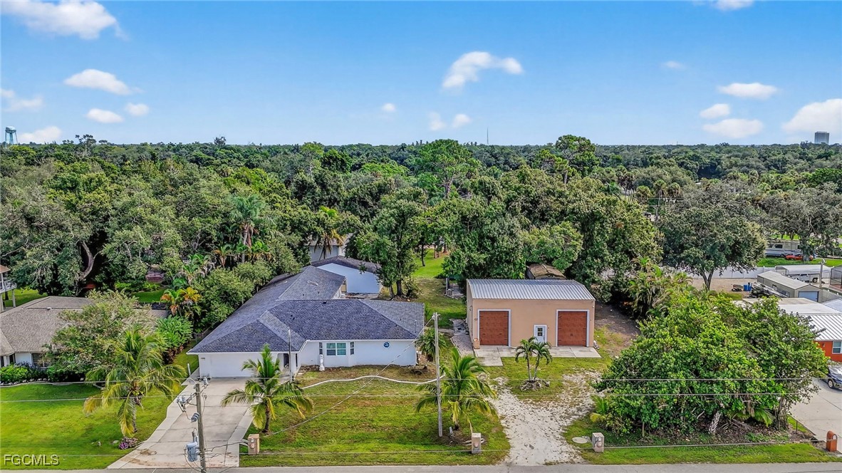 an aerial view of a house with a garden