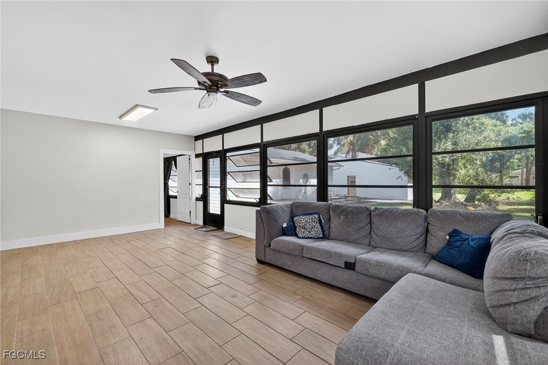 1672 Many Road North Fort Myers, FL 33903 - Photo 27 of 50 a living room with furniture and a large window