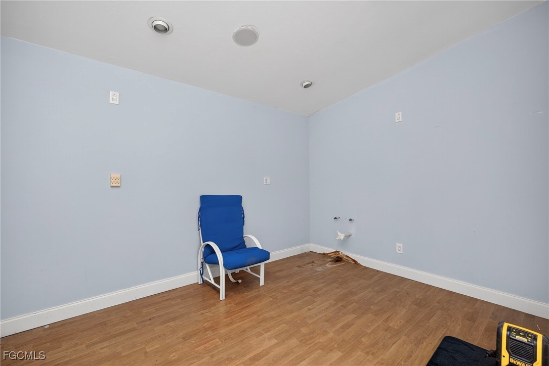 1672 Many Road North Fort Myers, FL 33903 - Photo 33 of 50 a room with a workspace