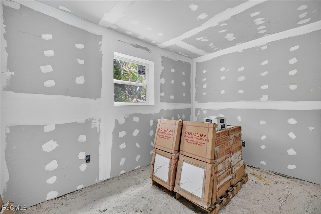 1672 Many Road North Fort Myers, FL 33903 - Photo 39 of 50 a bedroom with furniture and window