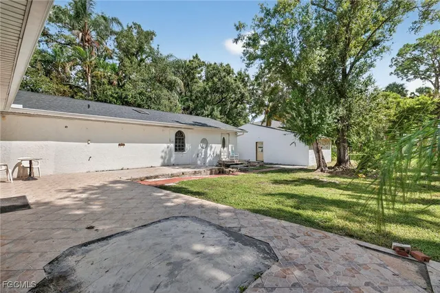 a house view with a backyard space