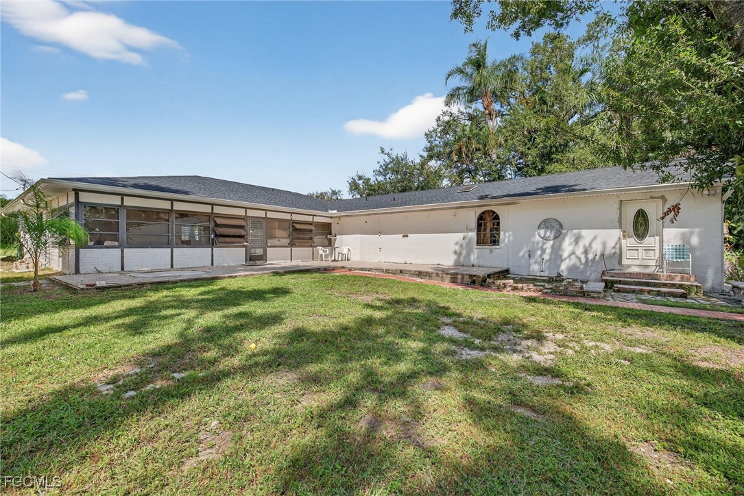 1672 Many Road North Fort Myers, FL 33903 - Photo 44 of 50 a house view with a garden space
