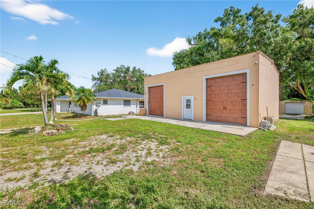 1672 Many Road North Fort Myers, FL 33903 - Photo 46 of 50 a house view with a garden space