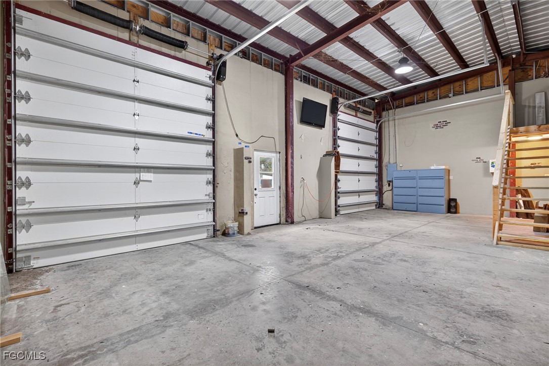 1672 Many Road North Fort Myers, FL 33903 - Photo 48 of 50 a view of an empty room with stairs and a furniture