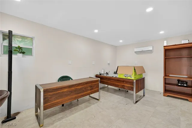 a room with furniture and a flat screen tv