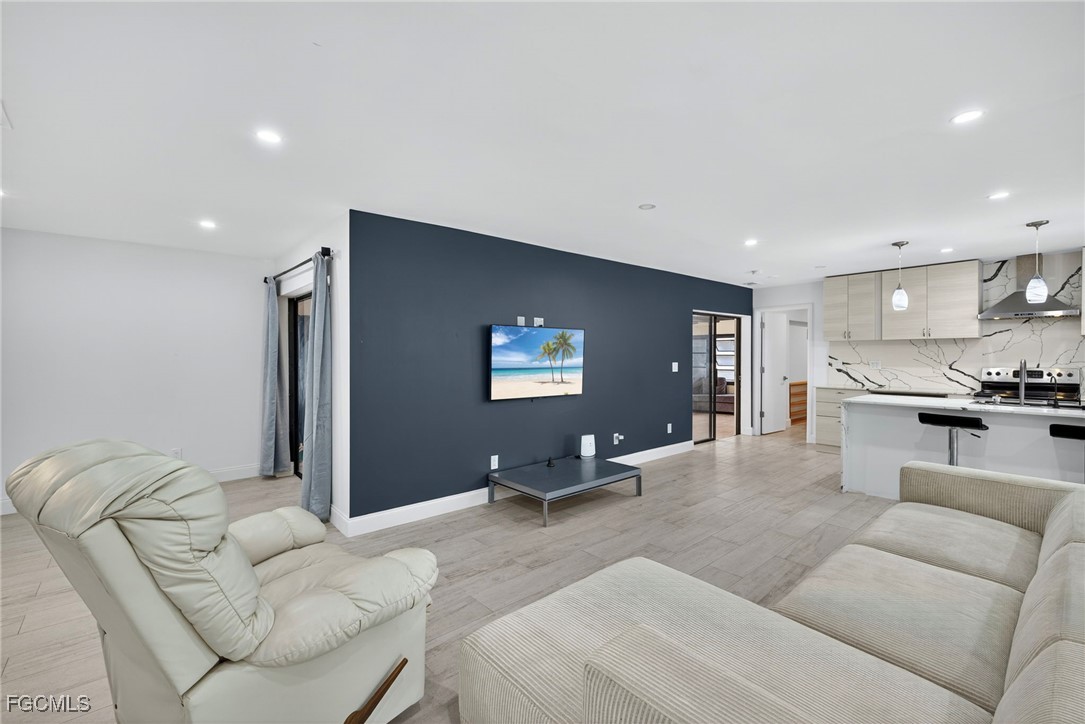 1672 Many Road North Fort Myers, FL 33903 - Photo 7 of 50 a living room with furniture and view of kitchen