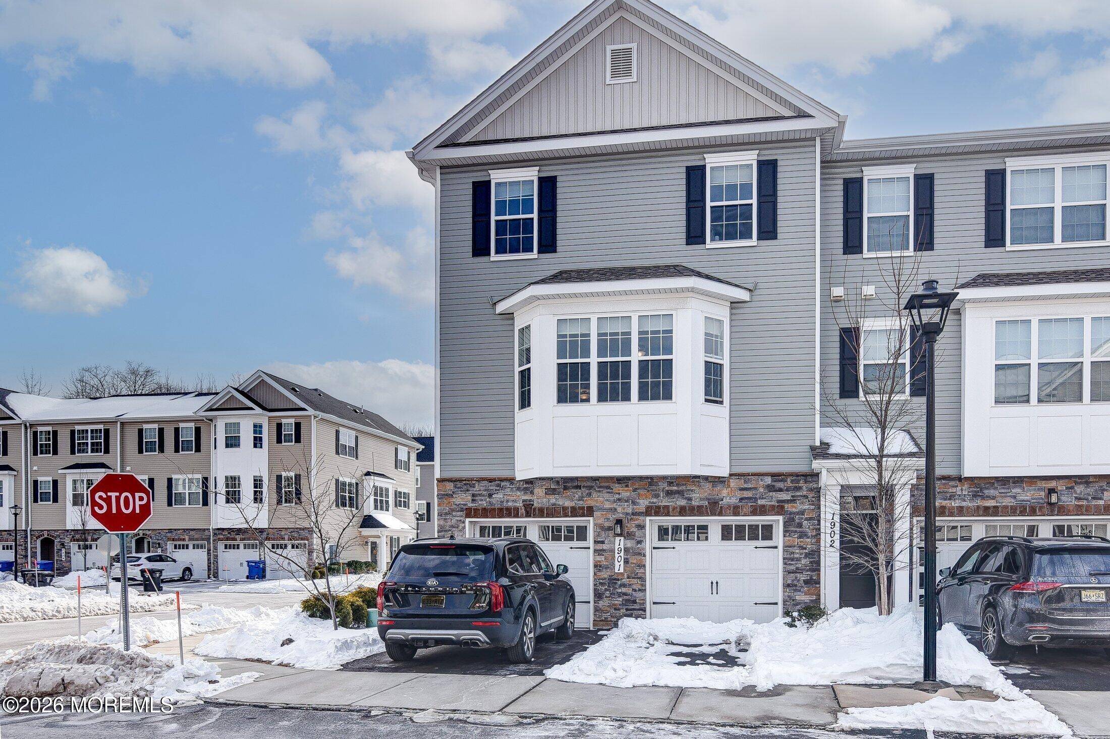 a front view of a building with many windows