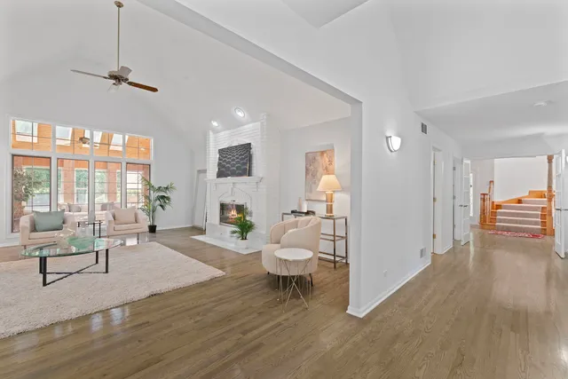 a living room with furniture and a table