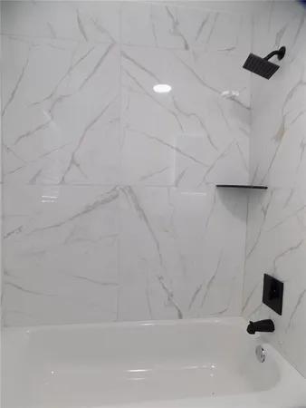 a bathroom with a bathtub
