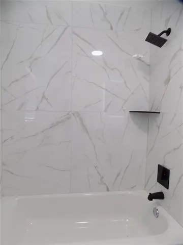a bathroom with a bathtub