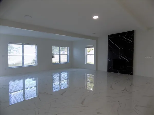 an empty room with windows