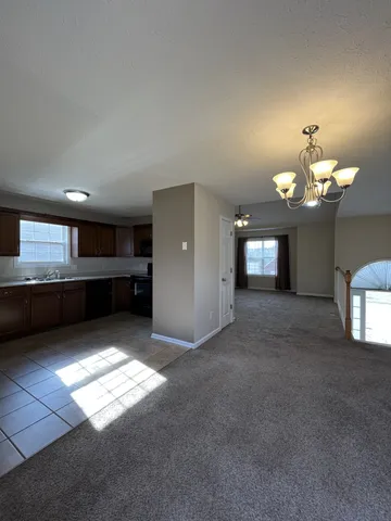 a view of a livingroom with a fireplace