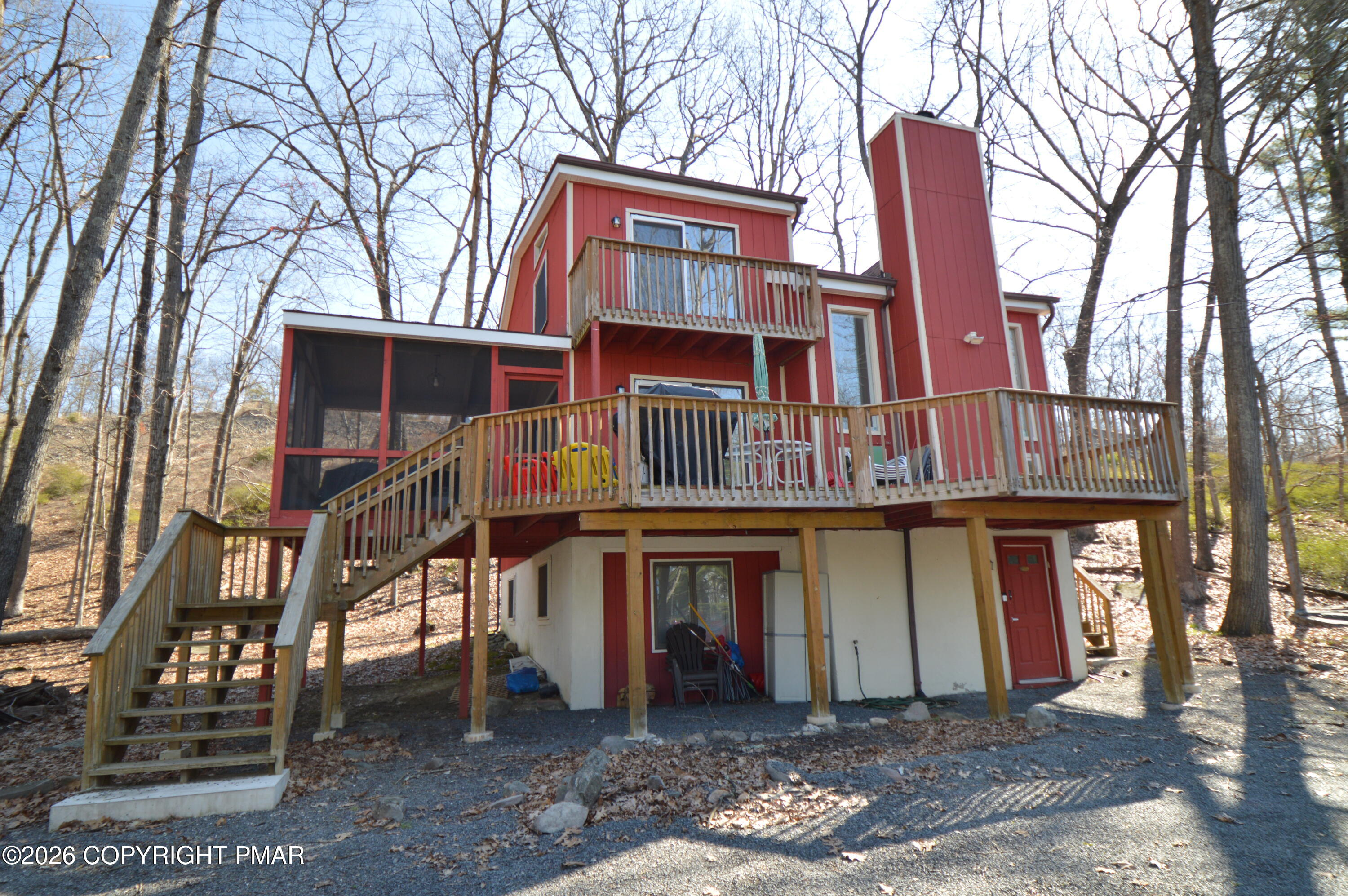 128 Ashley Court Bushkill, PA 18324 - Photo 2 of 43 a front view of a house with a yard