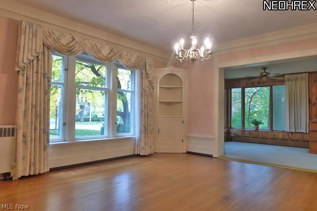 3008 Fontenay Road Cleveland, OH 44120 - Photo 6 of 25 Formal Living Room with beautiful moldings and hardwood floors, open to the Morning Room