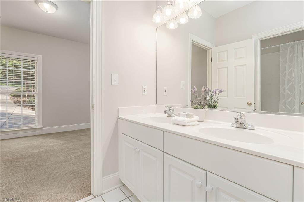 1816 Wild Fern Drive Oak Ridge, NC 27310 - Photo 25 of 48 Jack & Jill Bathroom