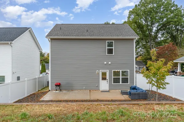 a house with trees in front of it