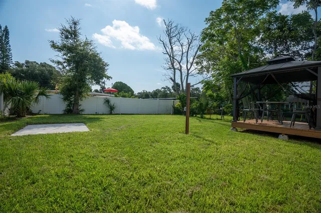 a view of a garden with a bench
