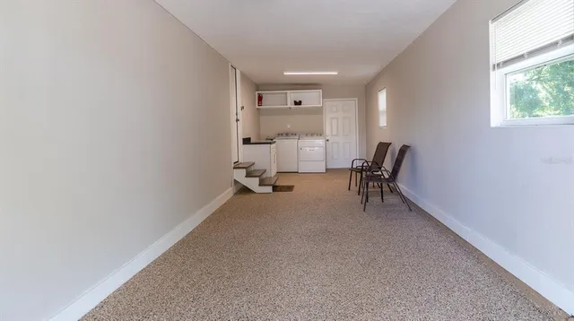 a view of a livingroom with lounge chair