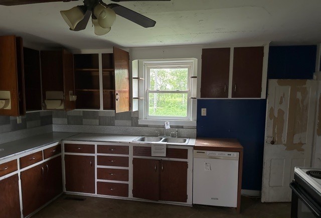 6802 North Quarry Road Warren, IL 61087 - Photo 7 of 21 a kitchen with a sink a refrigerator and window